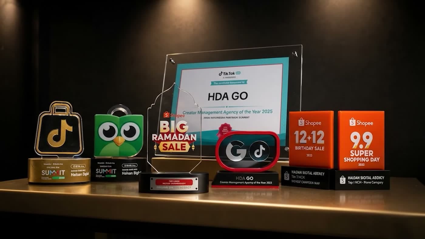 Platform awards and campaign plaques at the Haluan Digital office.